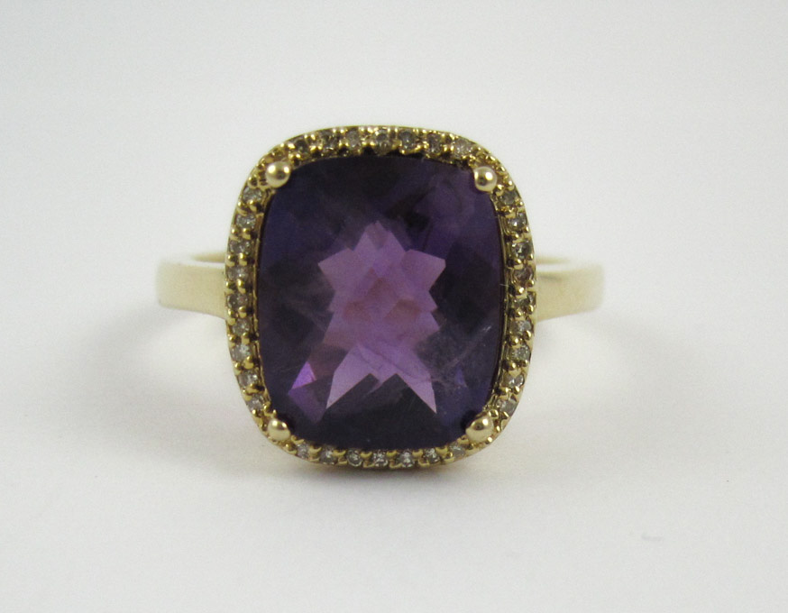 Appraisal: FOURTEEN KARAT GOLD AMETHYST AND DIAMOND RING having a approximately