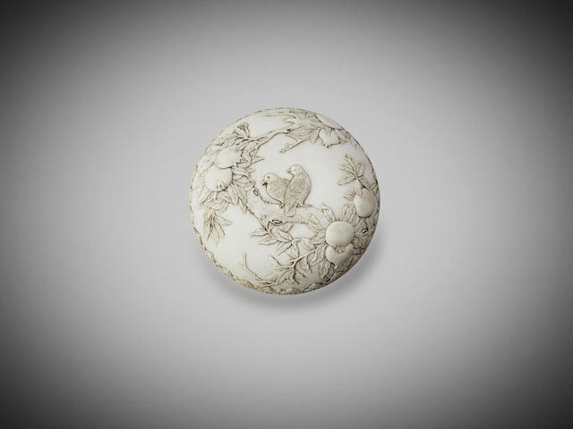 Appraisal: An unglazed and carved circular box for ink paste Daoguang