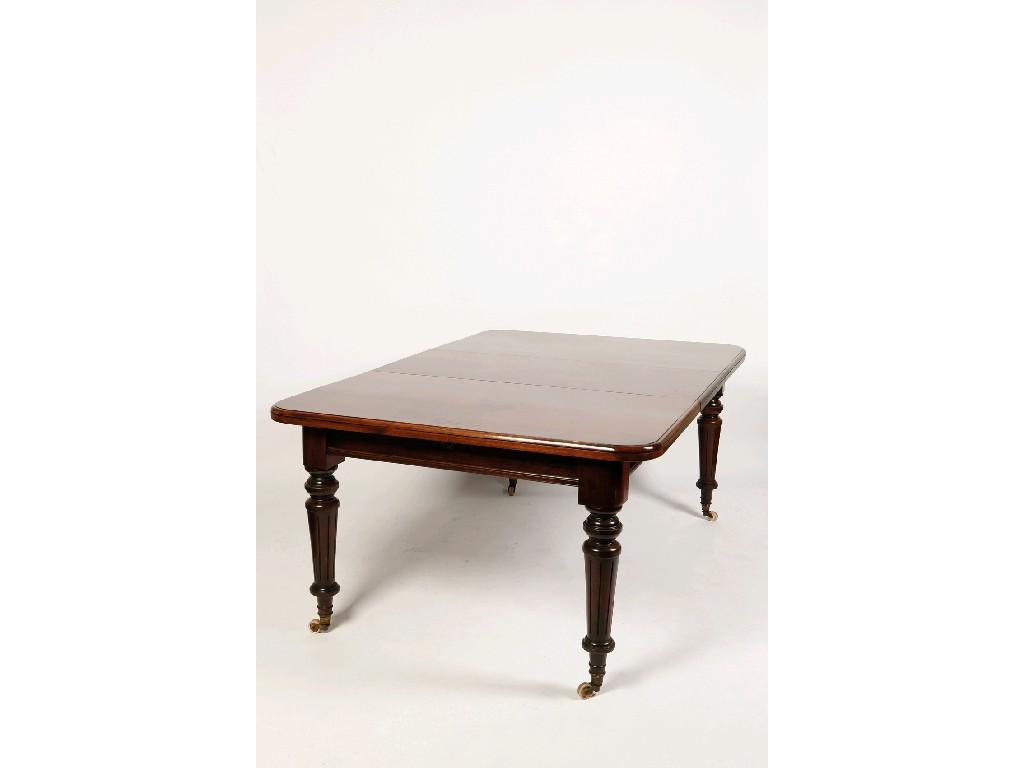 Appraisal: A VICTORIAN MAHOGANY EXTENDING DINING TABLE the rectangular top with