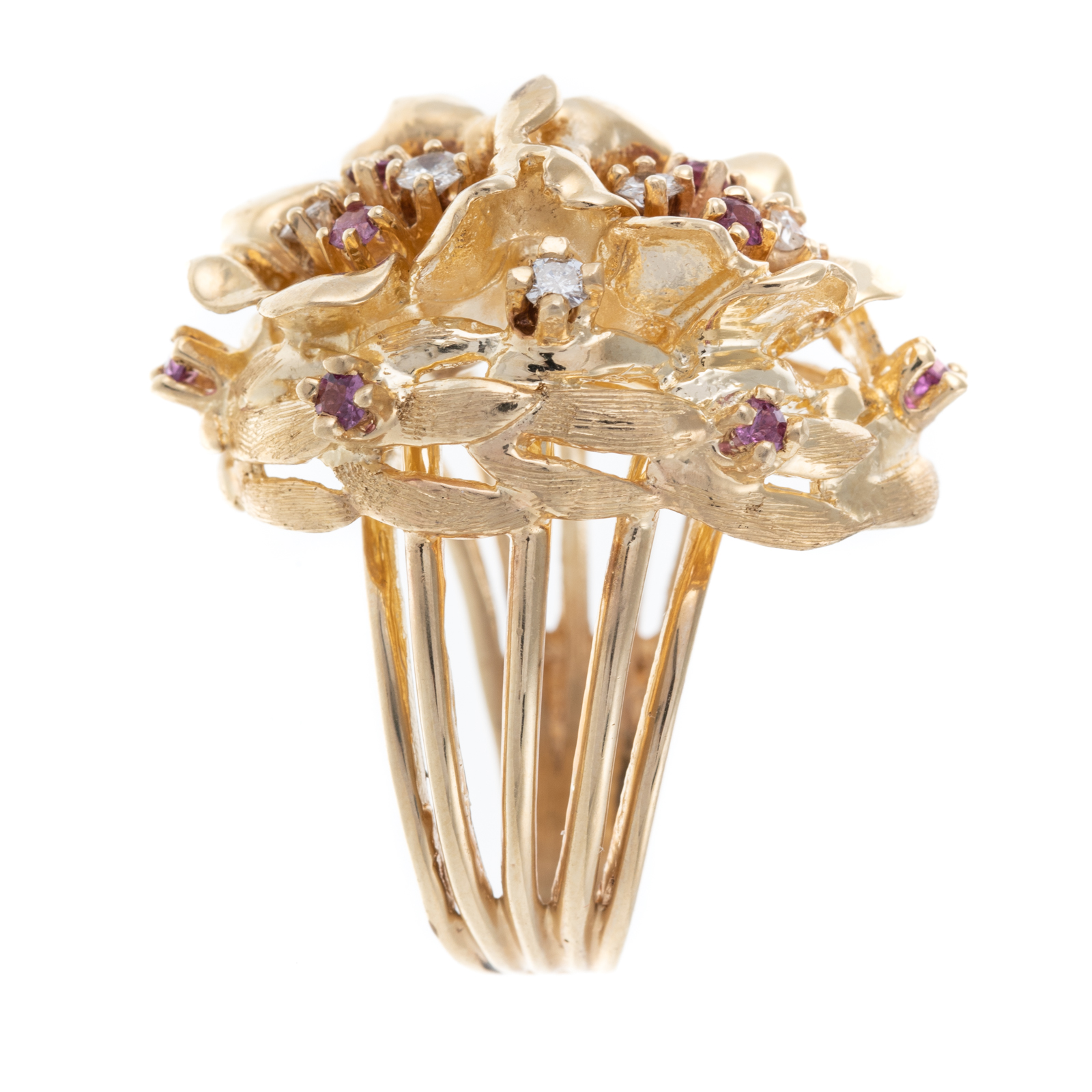 Appraisal: A VINTAGE DIAMOND RUBY FLOWER RING IN K K yellow