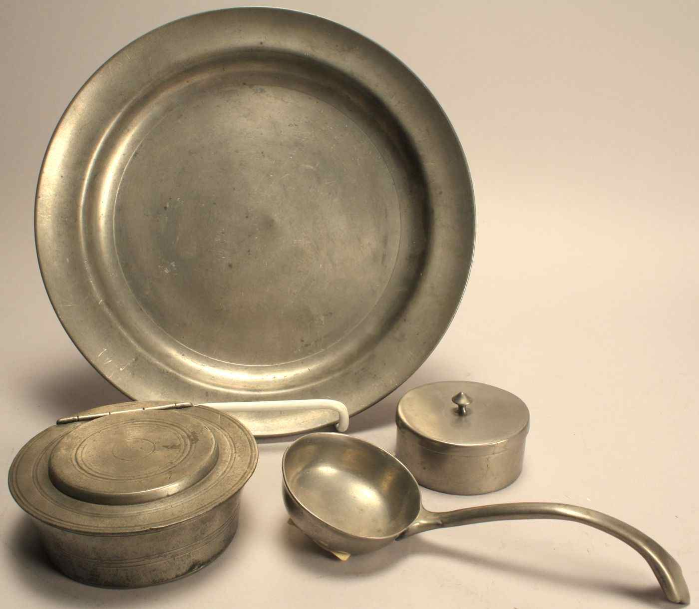 Appraisal: FOUR PIECES OF ANTIQUE AMERICAN PEWTER th Century Plate by