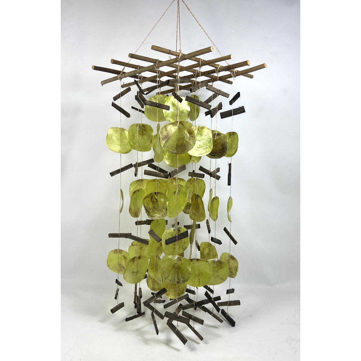 Appraisal: Colored Shell and Wood Modernist Breeze Chime Elements suspended from