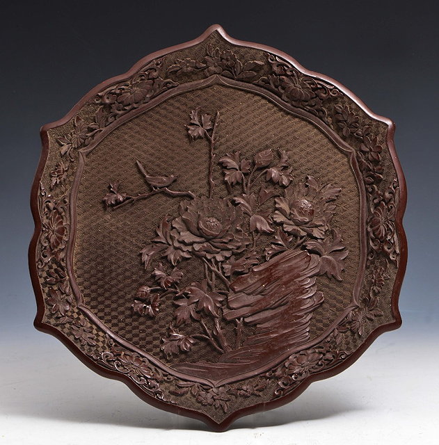 Appraisal: A CHINESE REDDISH BROWN LACQUER HEXAGONAL DISH finely carved in