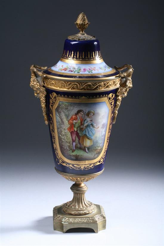 Appraisal: BRONZE-DOR MOUNTED S VRES PORCELAIN COVERED URN Circa Bleu lapis