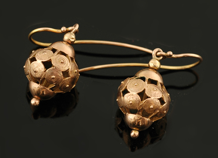 Appraisal: A pair of gold ball earrings Of pierced design with