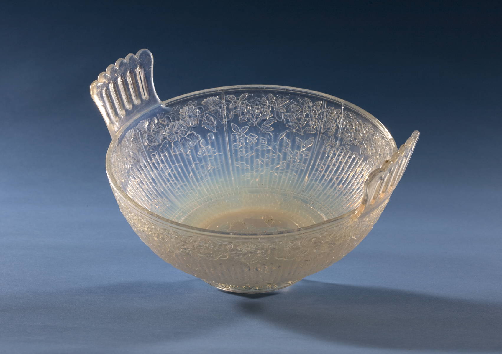 Appraisal: ENGLISH OPALESCENT PRESSED GLASS BOWL WITH RAISED CREST AND REGISTRY