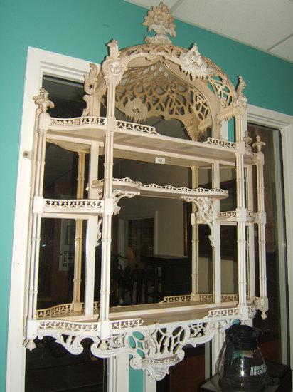 Appraisal: A chinoiserie style wall mirror the pierced copula with flower