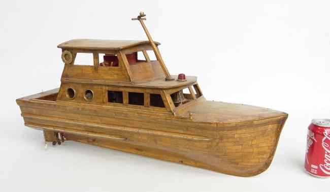 Appraisal: Vintage cabin cruiser Kiki model boat outfitted with interior furnishings