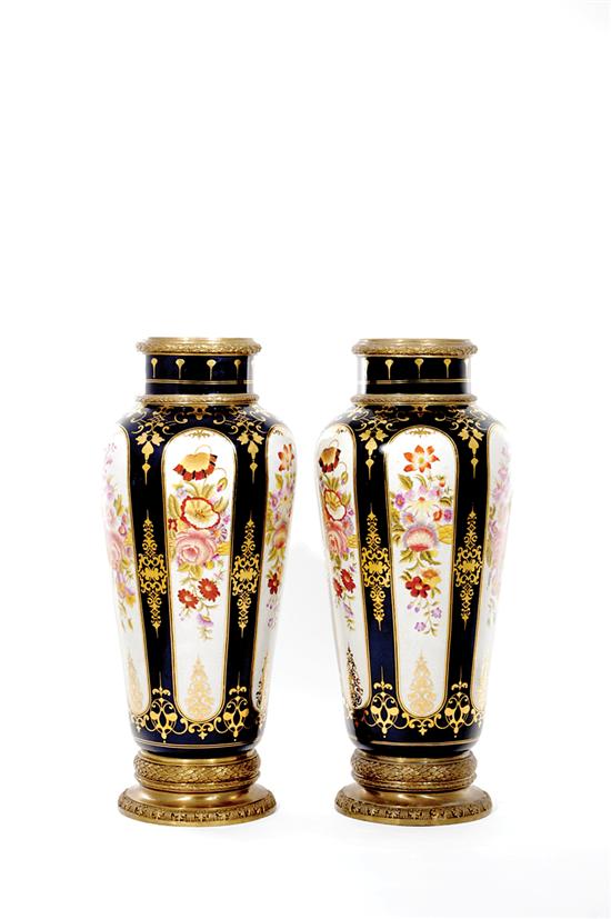 Appraisal: Pair metal-mounted porcelain vases tapering form decorated with floral panels