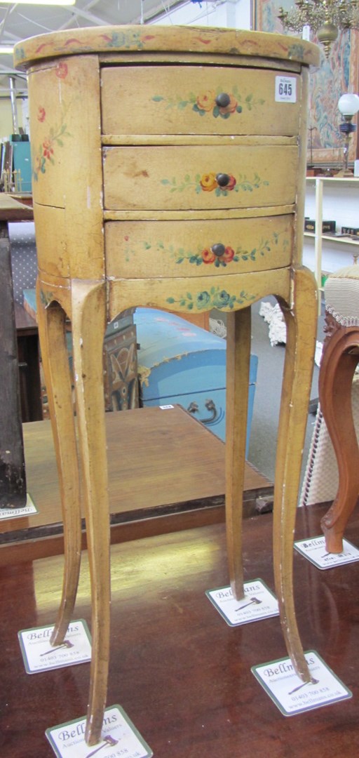 Appraisal: An early th century floral painted three drawer bedside table