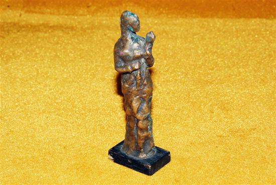 Appraisal: M MUSLIN Bronze figure of a woman Signed on verso