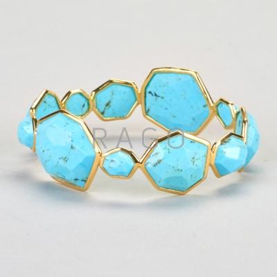 Appraisal: IPPOLITA K GOLD TURQUOISE BANGLE Large Hero bangle with faceted