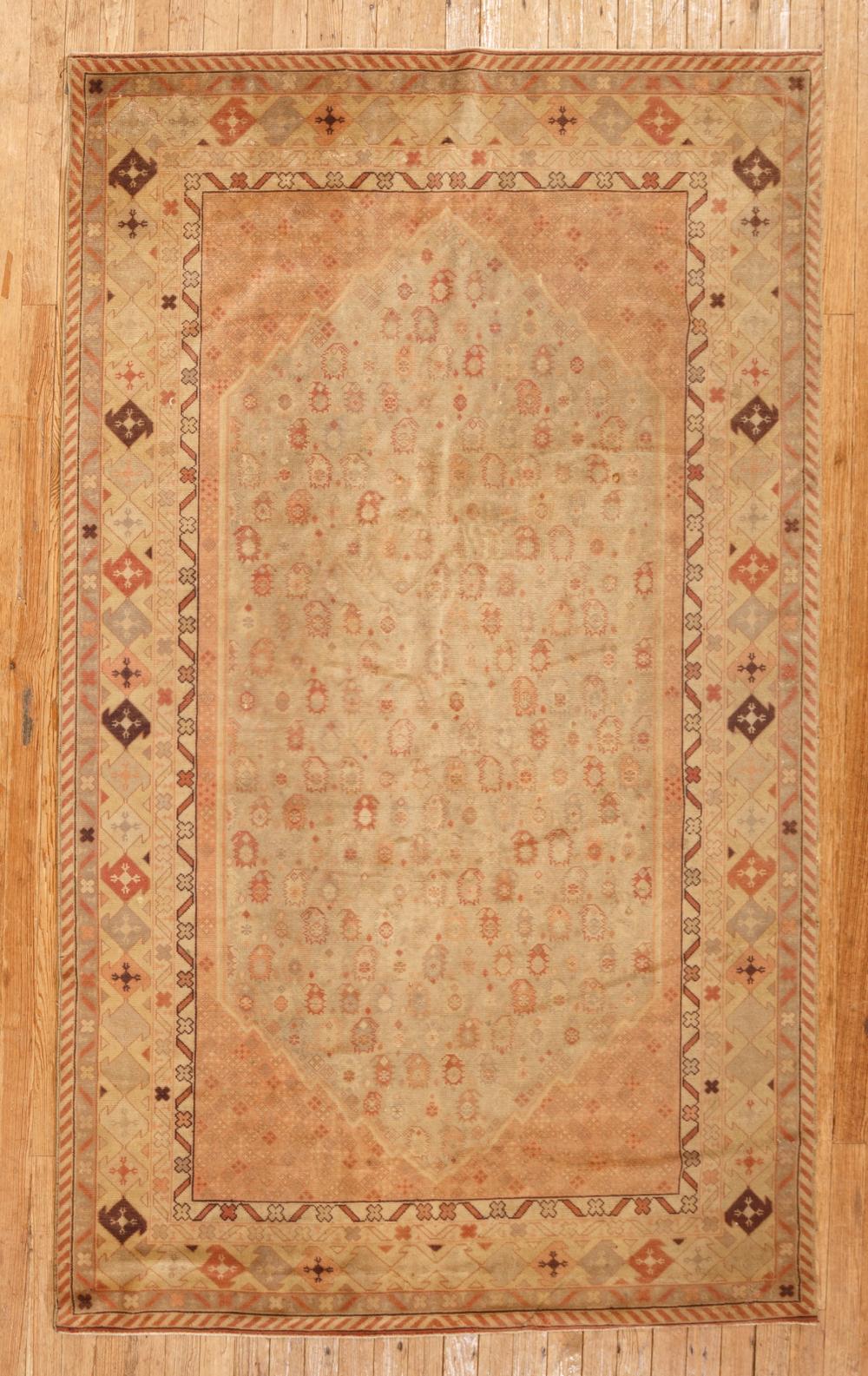 Appraisal: Turkish Oushak Rug olive and light brown ground repeating designs