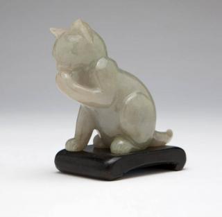 Appraisal: A Chinese carved jadeite cat figurine th century of mottled