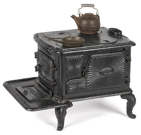 Appraisal: Cast iron Florence toy stove '' h Cast iron Florence