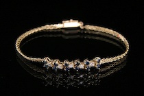 Appraisal: A Ladies' Gold Sapphire Diamond Bracelet k yellow gold bracelet