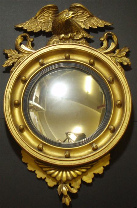 Appraisal: A Regency style circular convex mirror the circular plate with