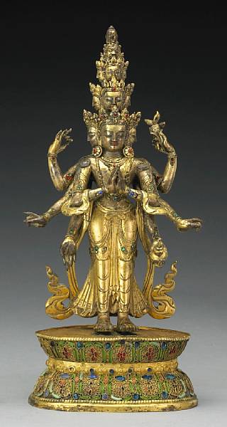 Appraisal: A Tibetan gilt bronze eleven-headed Guanyin th Century The tower