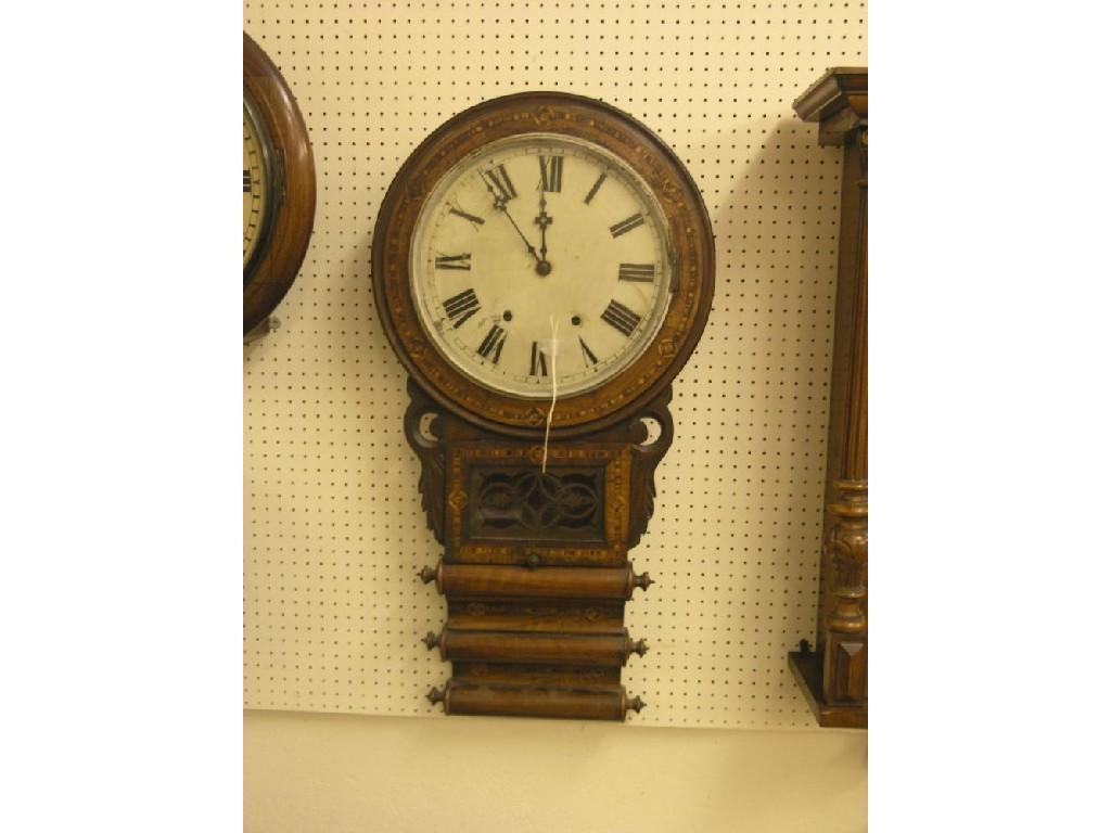 Appraisal: A Victorian walnut and parquetry drop-dial wall clock with enamelled