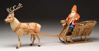 Appraisal: REINDEER CANDY CONTAINER WITH SANTA IN MOSS SLEIGH A fine