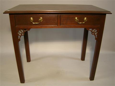 Appraisal: CHIPPENDALE STYLE MAHOGANY WRITING TABLE the rectangular top with shaped