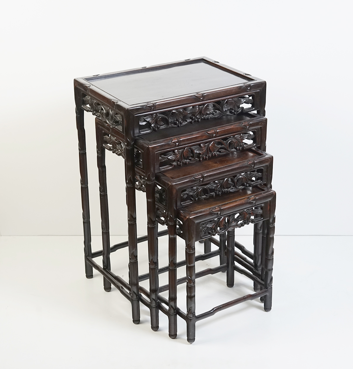 Appraisal: SET OF CARVED CHINESE NESTING TABLES - graduated Chinese nesting