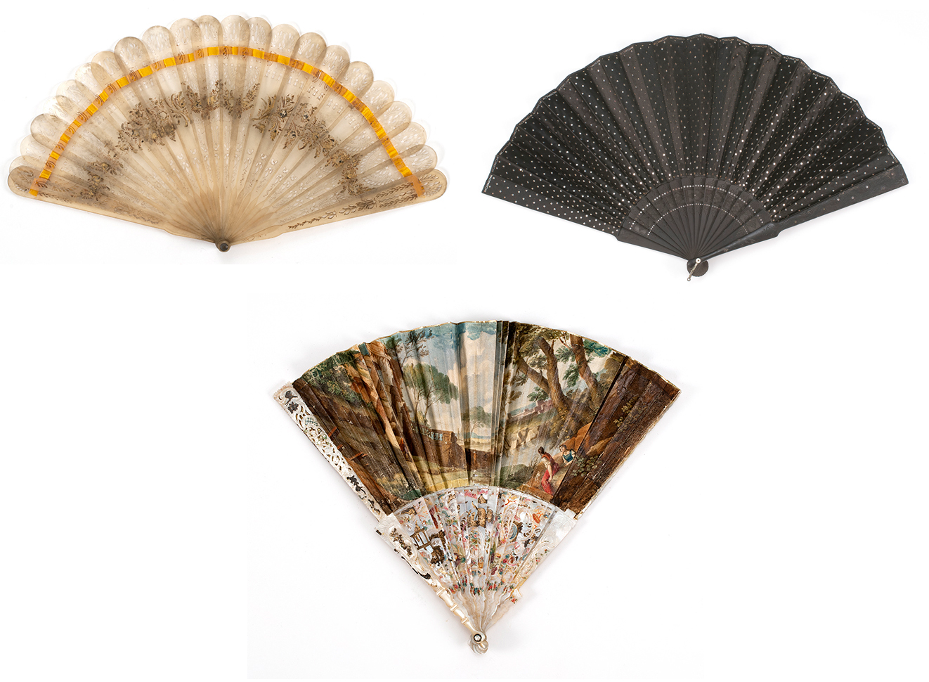 Appraisal: THREE ASSORTED FANS Late th Century pierced bris fan possibly