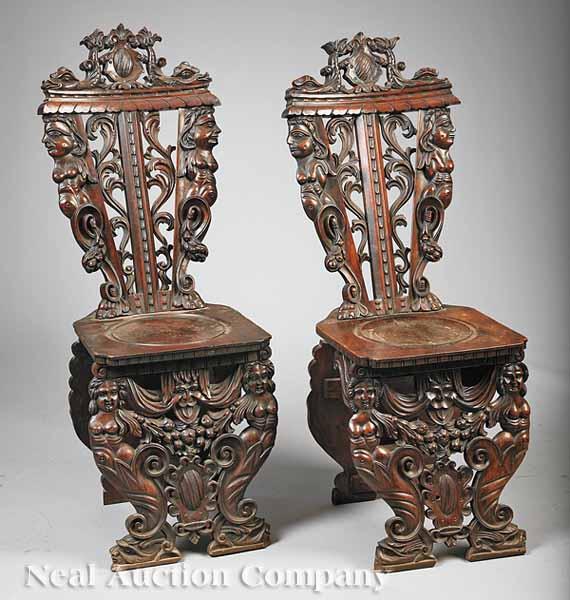 Appraisal: A Pair of Antique Italian Baroque-Style Carved Hall Chairs th