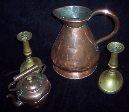 Appraisal: A copper rum jug with skirt base cm high and