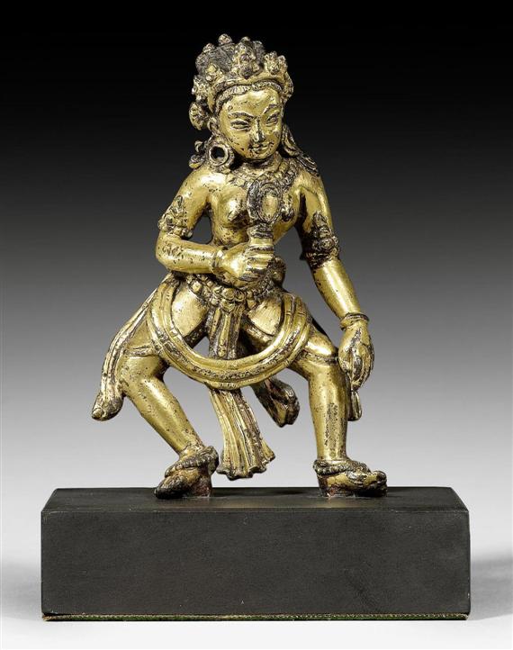 Appraisal: A CHARMING GILT COPPER ALLOY MINIATURE FIGURE OF A FEMALE