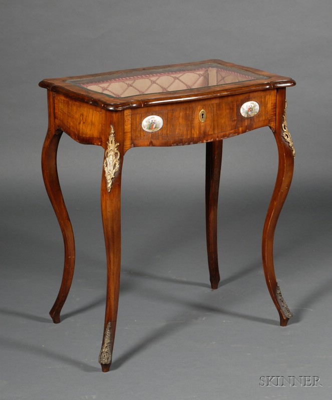 Appraisal: Louis XV Style Porcelain-mounted and Glass-top Walnut Vitrine Table early