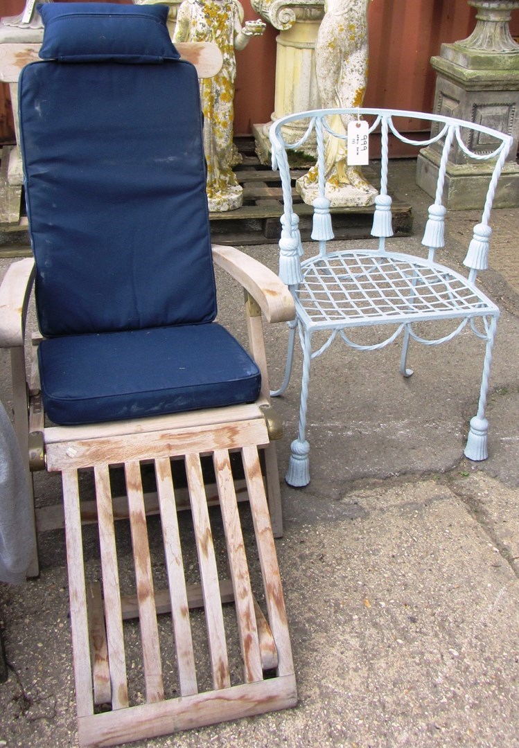 Appraisal: A th century grey painted wrought iron tub back chair