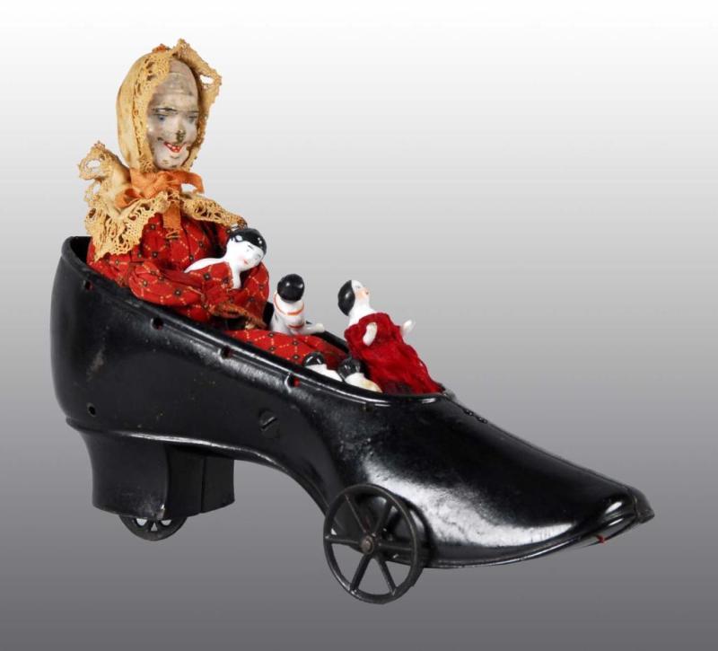 Appraisal: Cast Iron Ives Old Woman in the Shoe Pull Toy