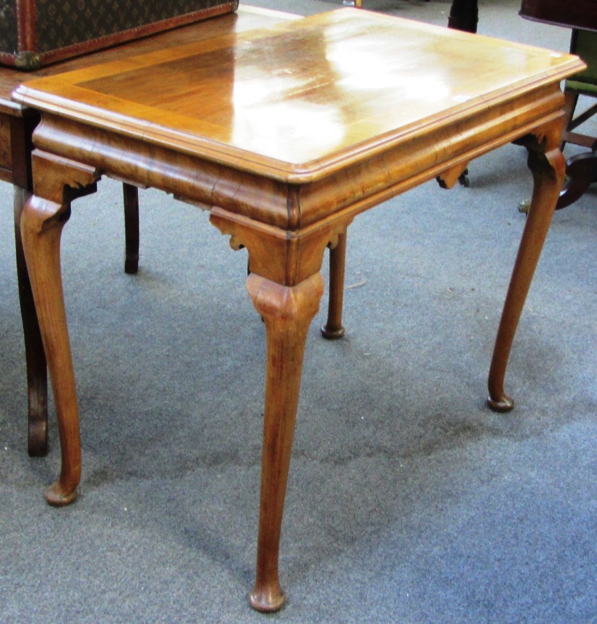 Appraisal: A mid th century style walnut rectangular centre table the