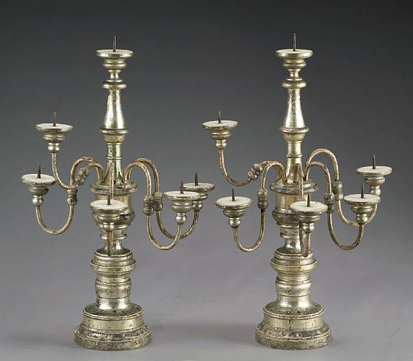 Appraisal: A pair of Italian silvered giltwood six-light candelabra late th