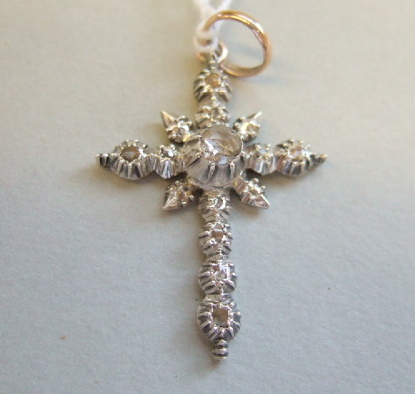 Appraisal: A rose diamond set pendant cross mounted with the principle