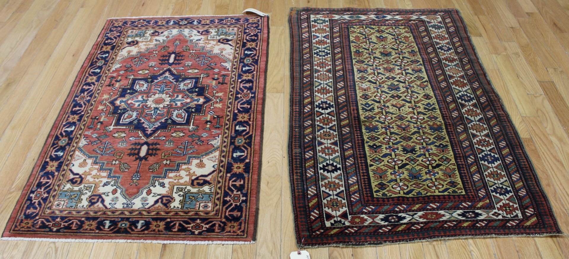 Appraisal: ANTIQUE AND FINELY HAND WOVEN CARPETS Both carpets great One