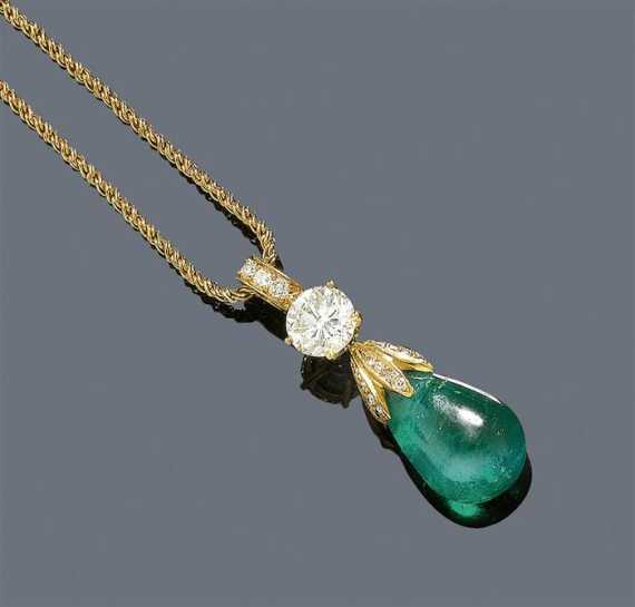 Appraisal: EMERALD AND DIAMOND PENDANT WITH CHAIN ca Yellow gold Decorative