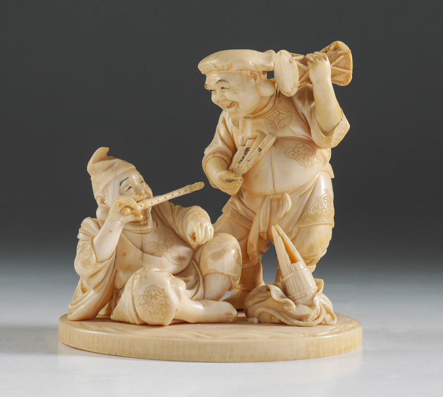 Appraisal: ANTIQUE CARVED IVORY MUSICIAN FIGURAL GROUP Certified antique ivory circa