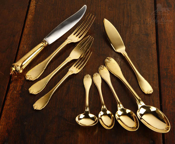 Appraisal: E Puiforcat vermeil silver flatware service E Puiforcat vermeil silver