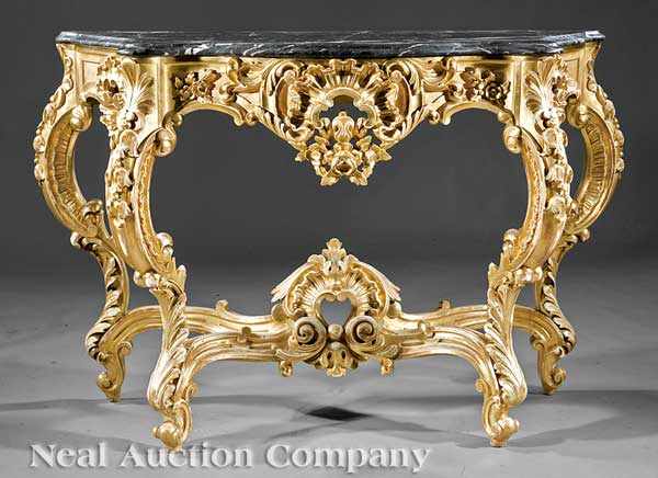 Appraisal: An Antique Continental Rococo-Style Giltwood Console serpentine marble top foliate