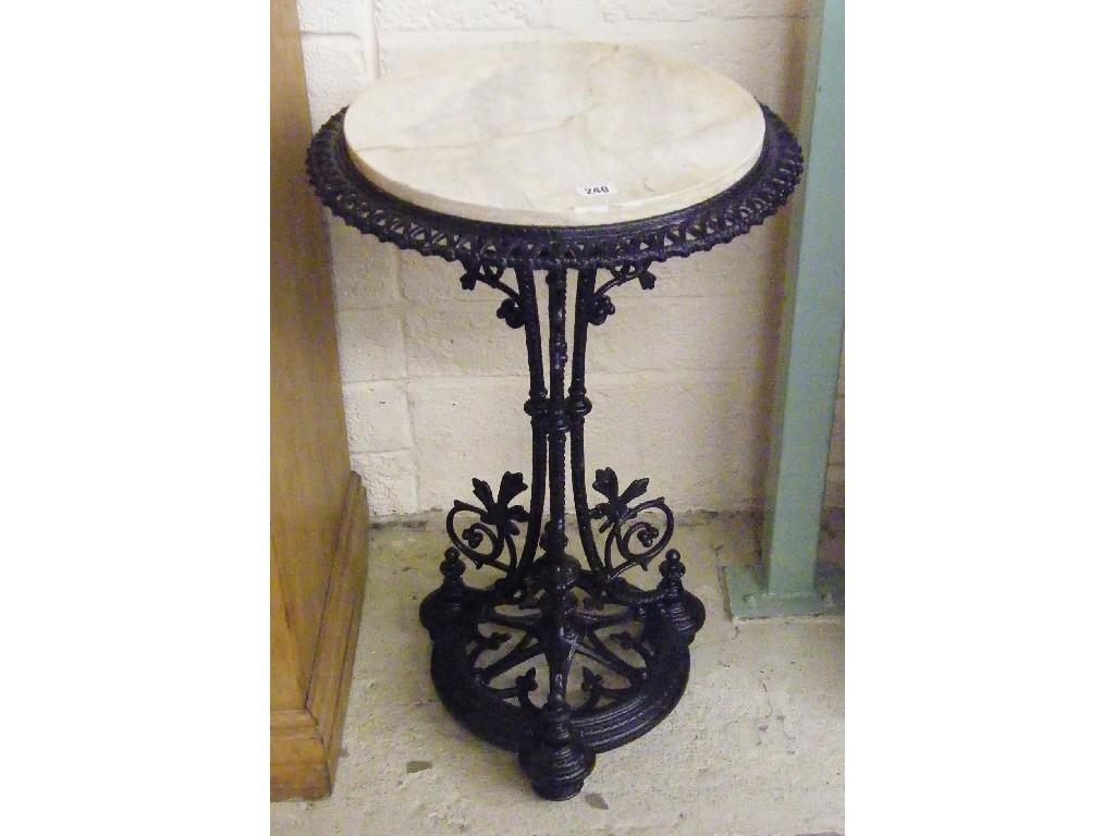 Appraisal: Circular painted wrought iron marble topped garden table diameter