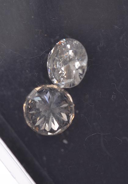 Appraisal: TWO ROUND BRILLIANT CUT DIAMONDS WEIGHING CTS AND CTS TWO