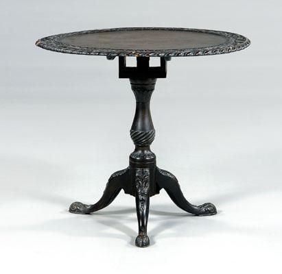 Appraisal: Chippendale tilt-top tea table pierce-carved top tilting above spiral-turned baluster