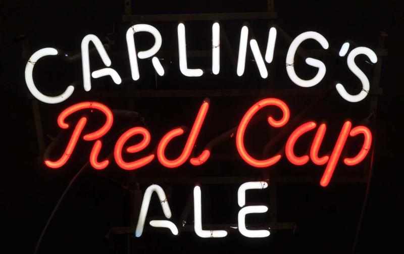 Appraisal: Carling Red Cap Neon Sign Description s Brewing Corp of