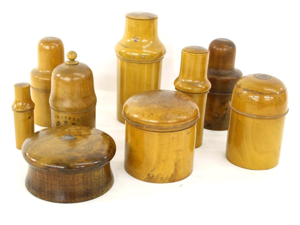 Appraisal: Nine various boxwood circular containers and covers including bottle holders