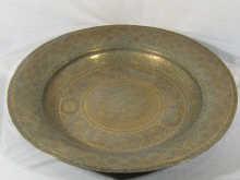 Appraisal: A large brass th century Persian open dish finely worked