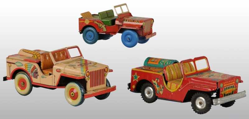 Appraisal: Lot of Tin Litho Jeep Friction Toys Description Japanese Working