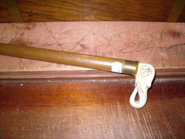 Appraisal: A walking stick with ivory elephant form handle