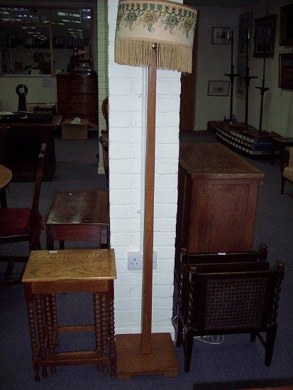 Appraisal: A nest of three oak tables on bobbin turned legs